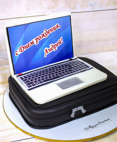 Праздничный торт «Ноутбук на сумке»